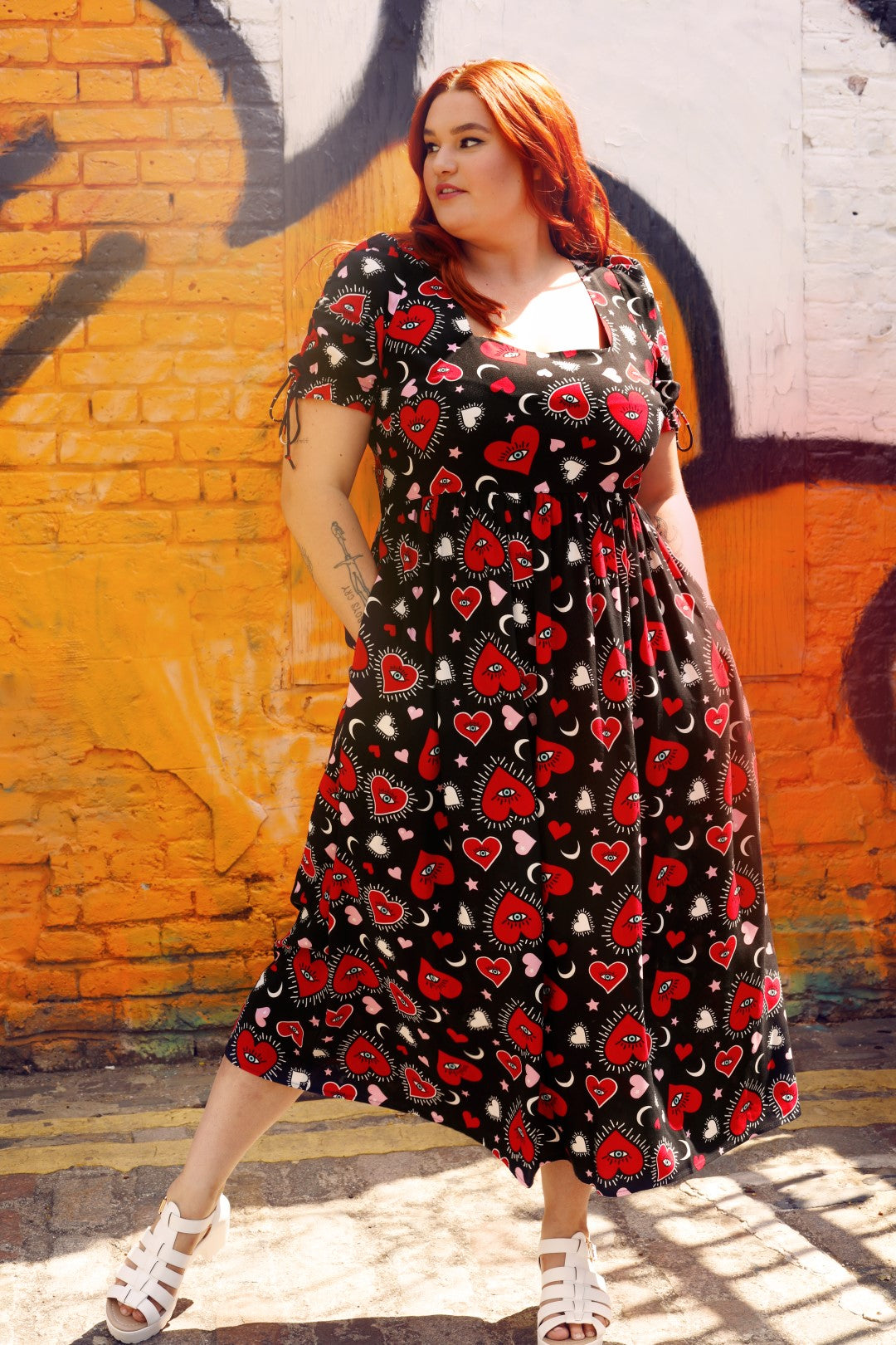 Black dress with red hearts best sale